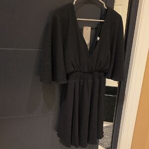 Glam Black Mini Dress with V-Neck